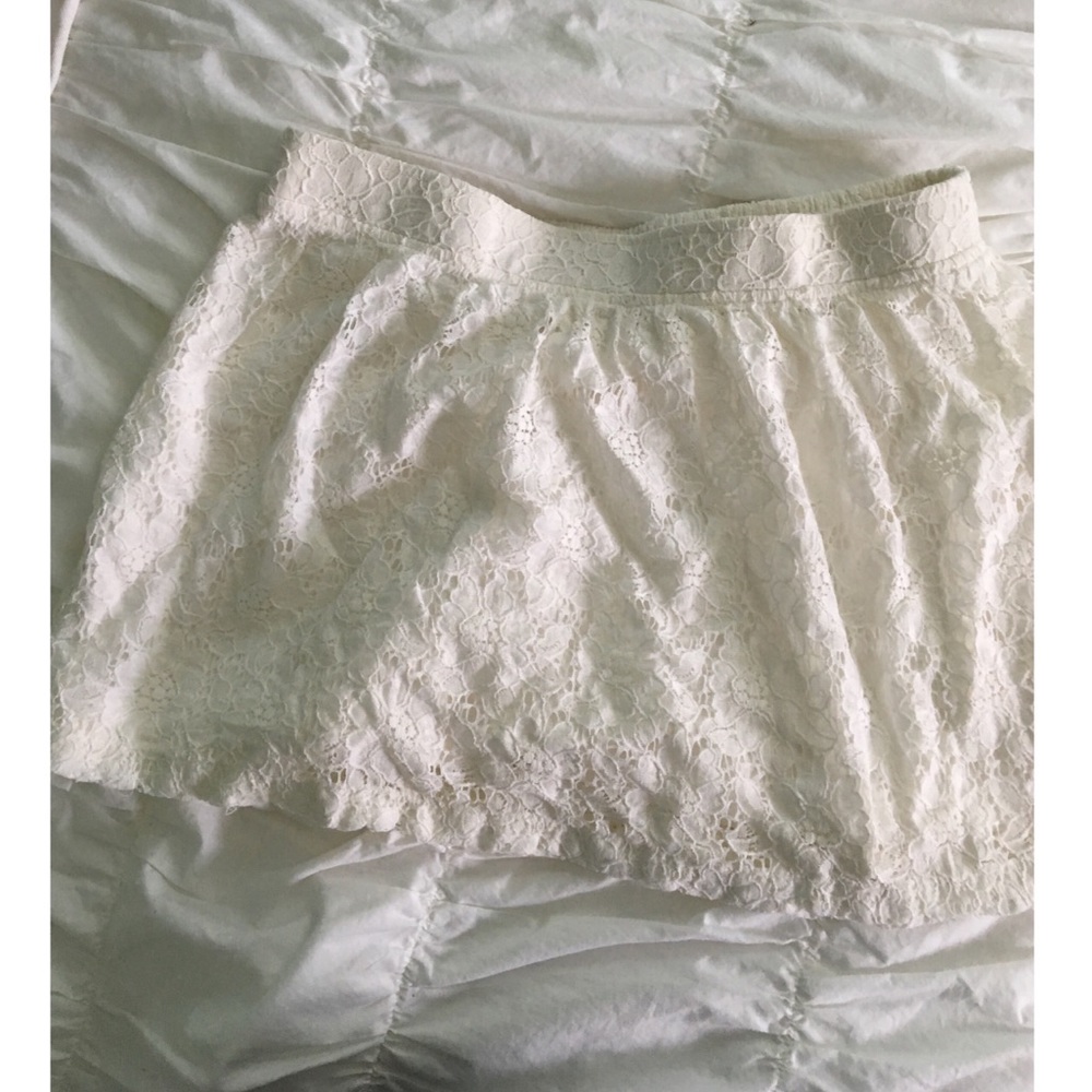 Large flowy white lace mini skirt